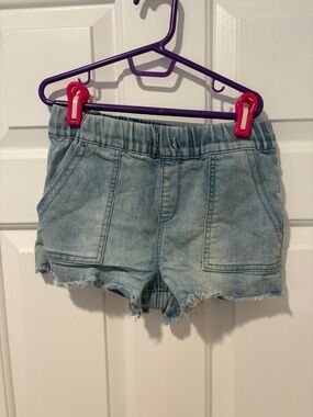 Girls elastic waist denim shorts size medium by Joes jeans.